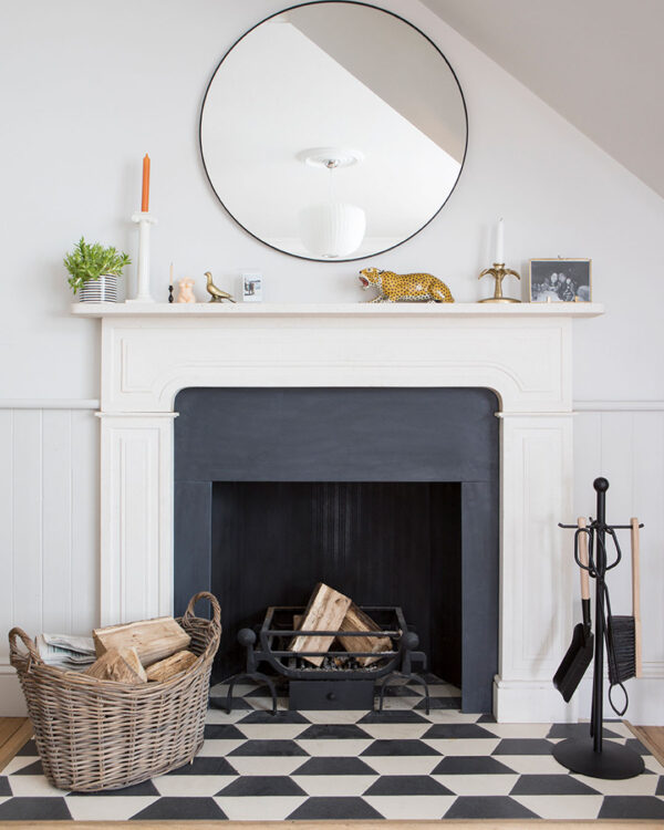 Hex monochrome patterned cement tiles fireplace decoration