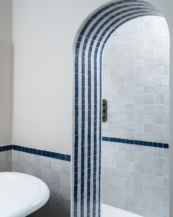 Blue Marine Stripes Zellige tiles arched shower door bathroom